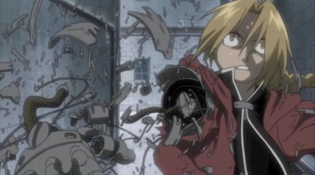 Edward Elric Fullmetal Alchemist showing automail metal arm anime screenshot