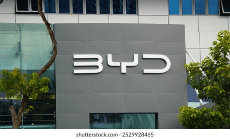 BYD corporate headquarters building exterior or logo on modern office glass