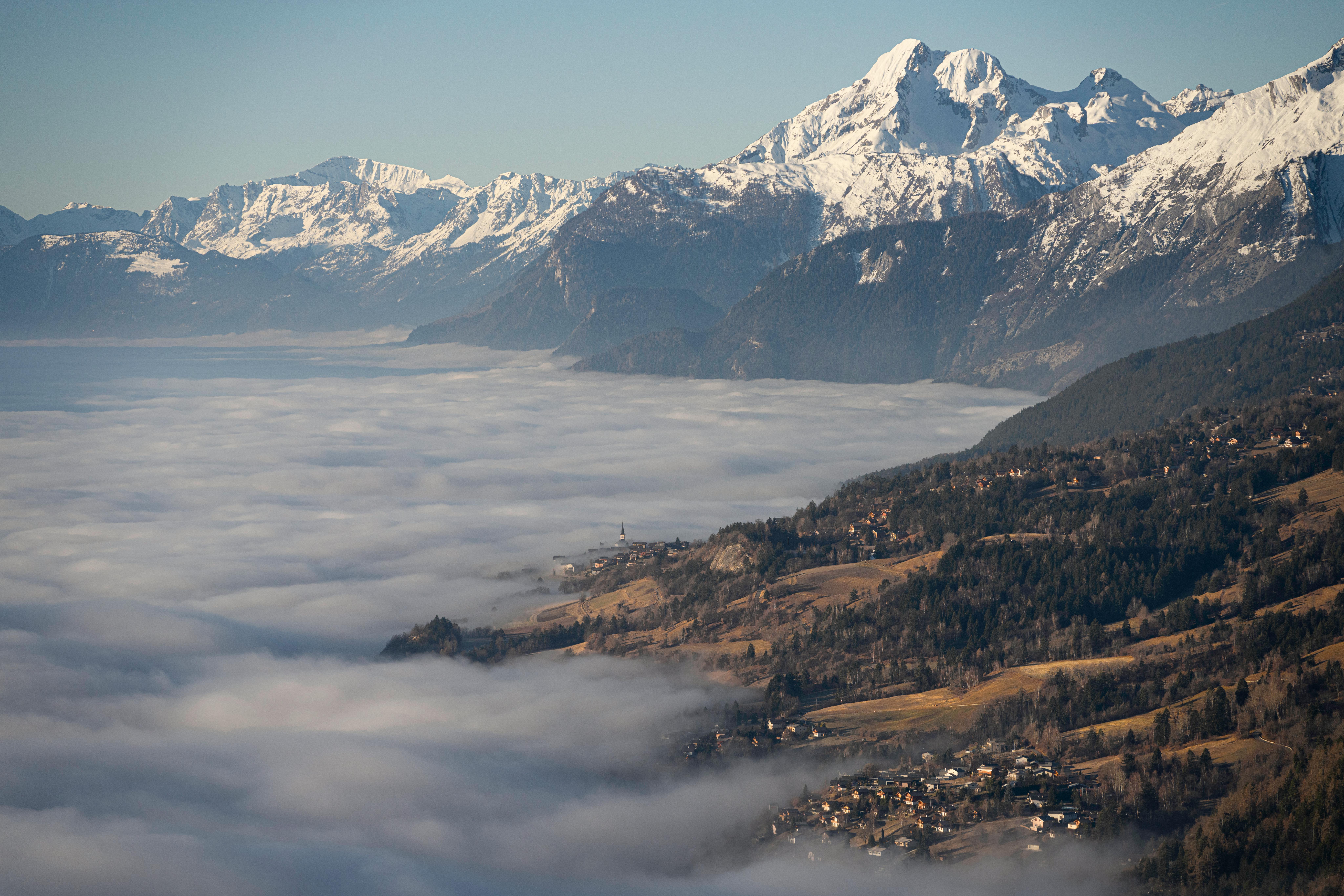 Peaceful sunrise over swiss alps crans-montana mountains winter