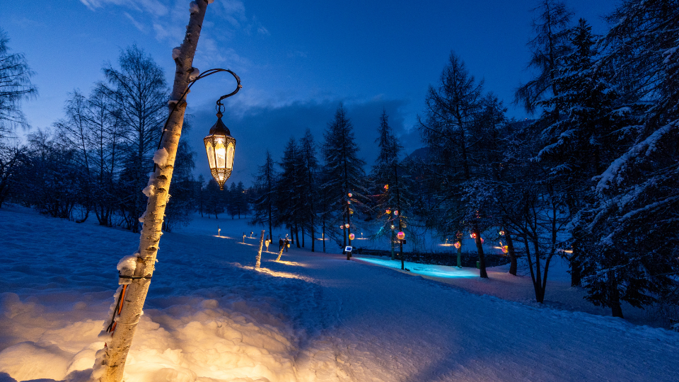 Night view of Crans-Montana ski resort winter snow and lights