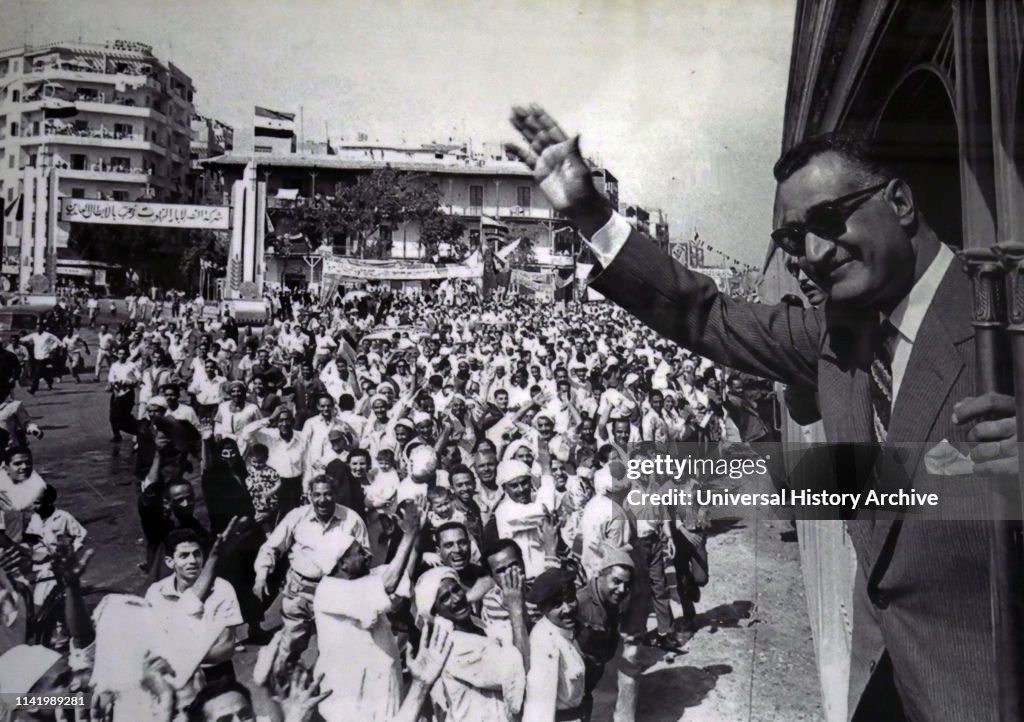 Gamal Abdel Nasser giving a speech to a crowd black and white
