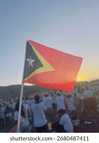 Timor-Leste flag waving sunrise mountains landscape hope freedom