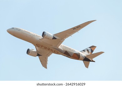 Etihad Airways and China Eastern aircraft tails side by side on tarmac, realistic, corporate photography