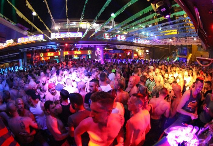 Yumbo Centrum Gran Canaria nightlife neon lights crowd