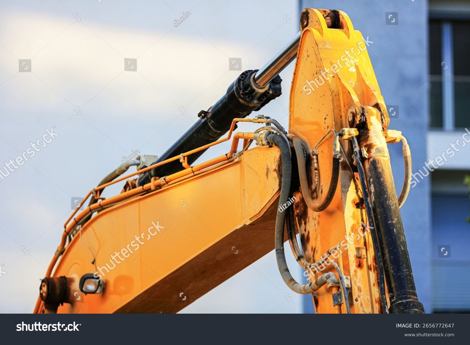 Construction excavator hydraulic arm cylinders closeup